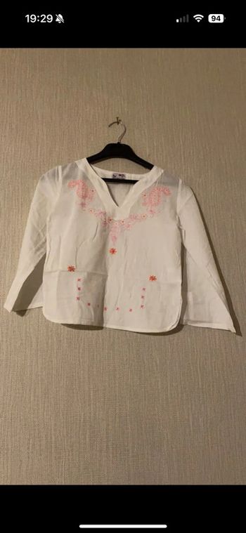 Chemisier rose et blanc 8 ans