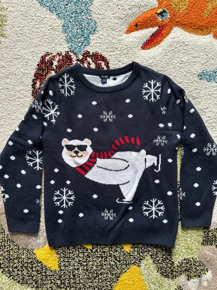 Pull Noël taille 8 ans