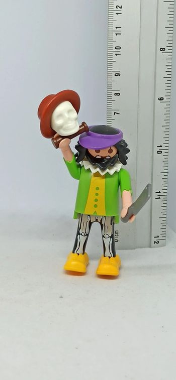 Homme clown avec hachoir et crane playmobil