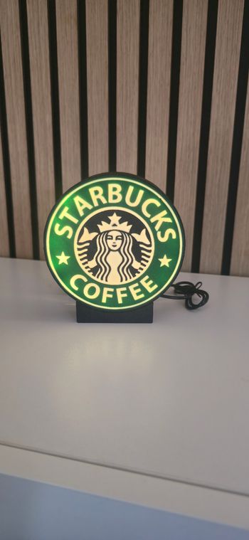 Logo starbucks coffee fait aussi veilleuse
