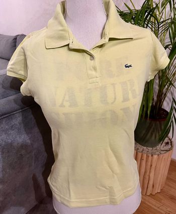 Polo femme Lacoste taille 36