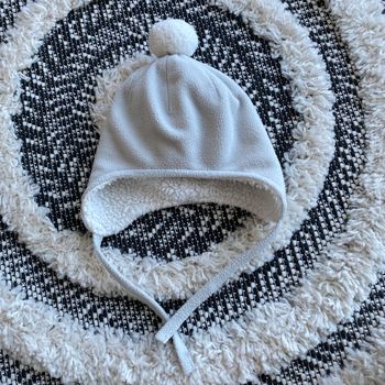 Bonnet fourré avec pompon
