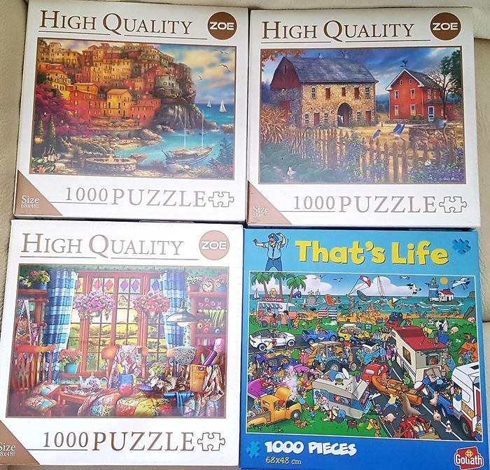 Lot de 4 puzzles en 1000 pièces dont 3 Neufs