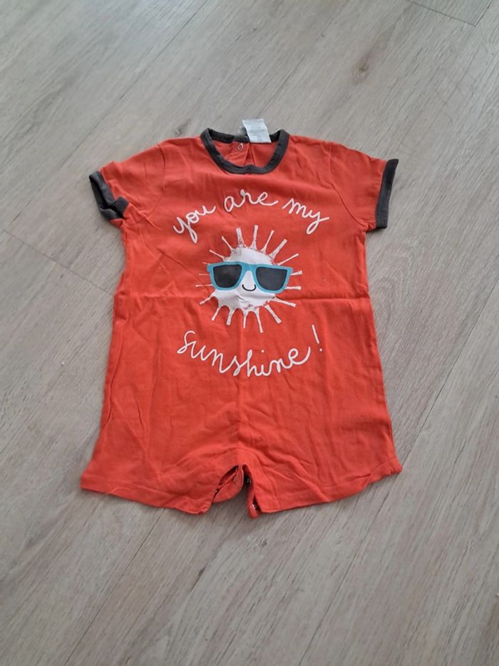 Combinaison orange 24 mois