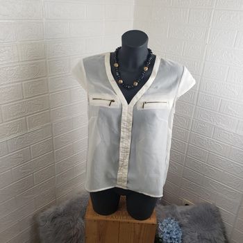 Blouse sans manche taille 38