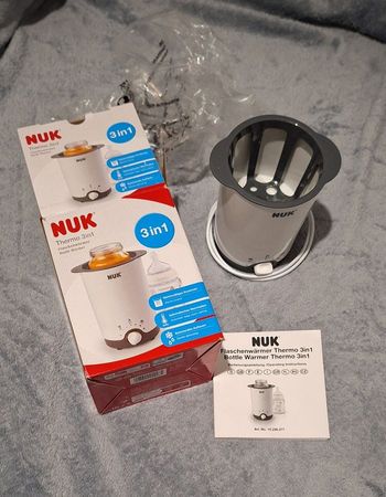 Chauffe biberon nuk