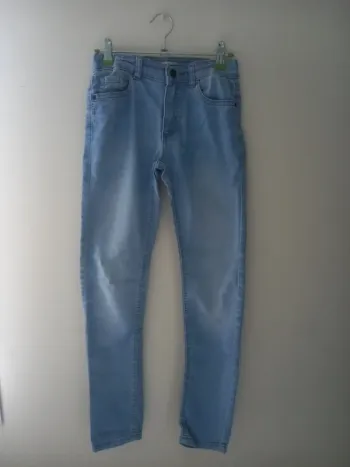 Pantalon jean bleu de la marque " Npo junior ".