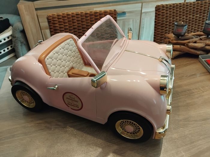 Voiture poupée our generation