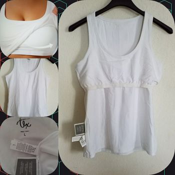 Débardeur  de sport         blanc avec maintient  taille L très bon état
