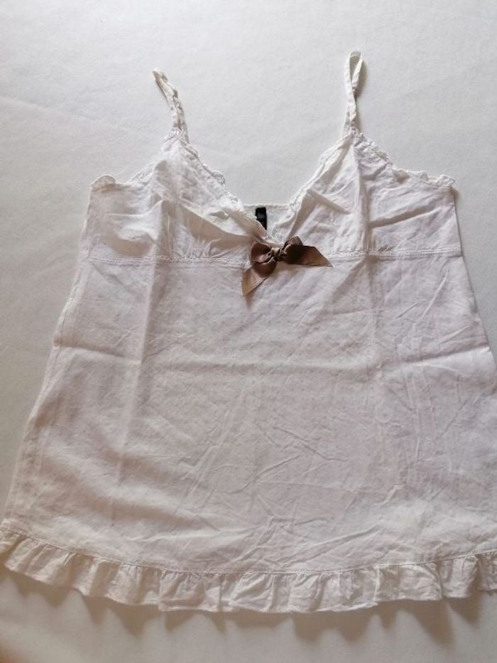 Débardeur comme neuf belle qualité beau tissu