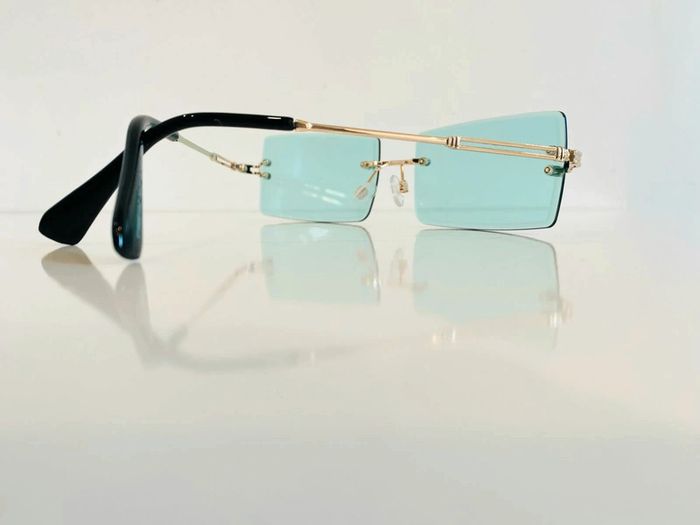 Lunette de soleil mixte percée verres verts uvprotection catégorie 2 - photo numéro 13