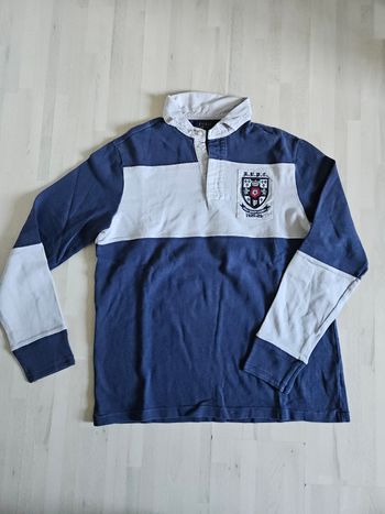 polo t-shirt manches longues
marque ralph lauren 1926-29
pour homme
Bleu marine et blanc
Vintage et rare.
Taille M Très bon état 