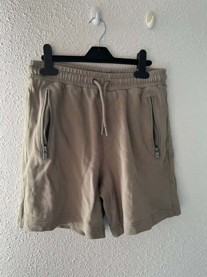 Short avec poches kiabi taille XS🌹