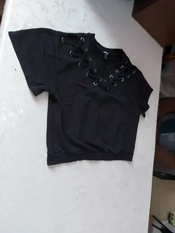 Pull noir manches courtes