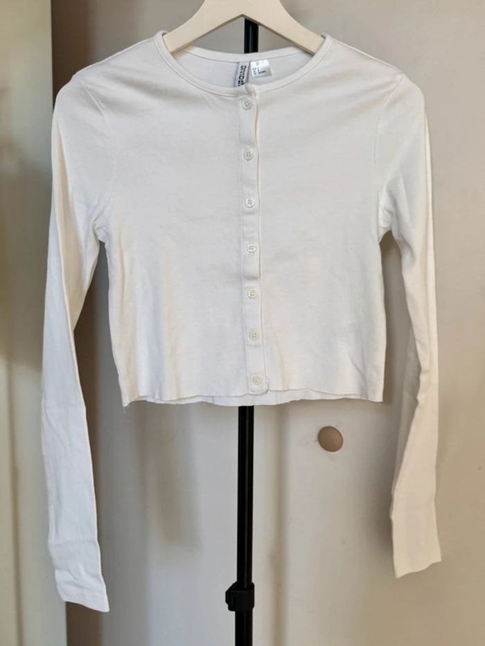 Top court cropped blanc bouton S H&M en coton