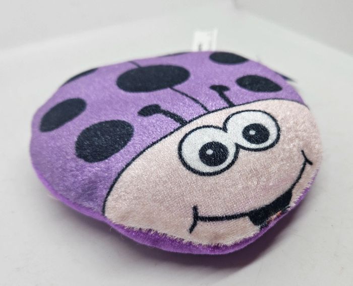 Coccinelle.
13x13,5x3cm.
Neuve. - photo numéro 2