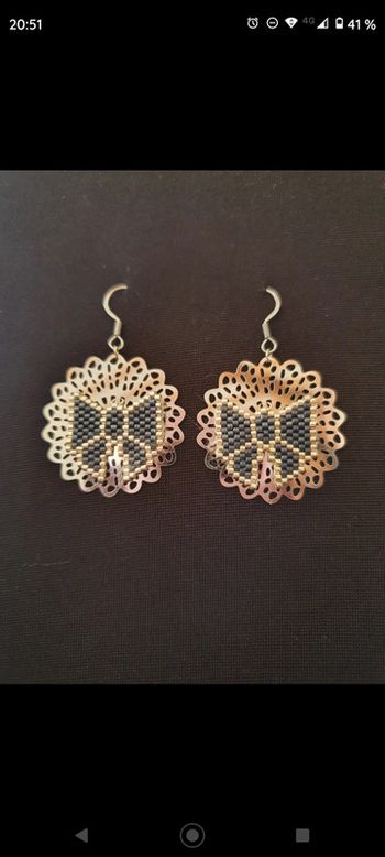 Boucles d'oreilles doré décoration noeud