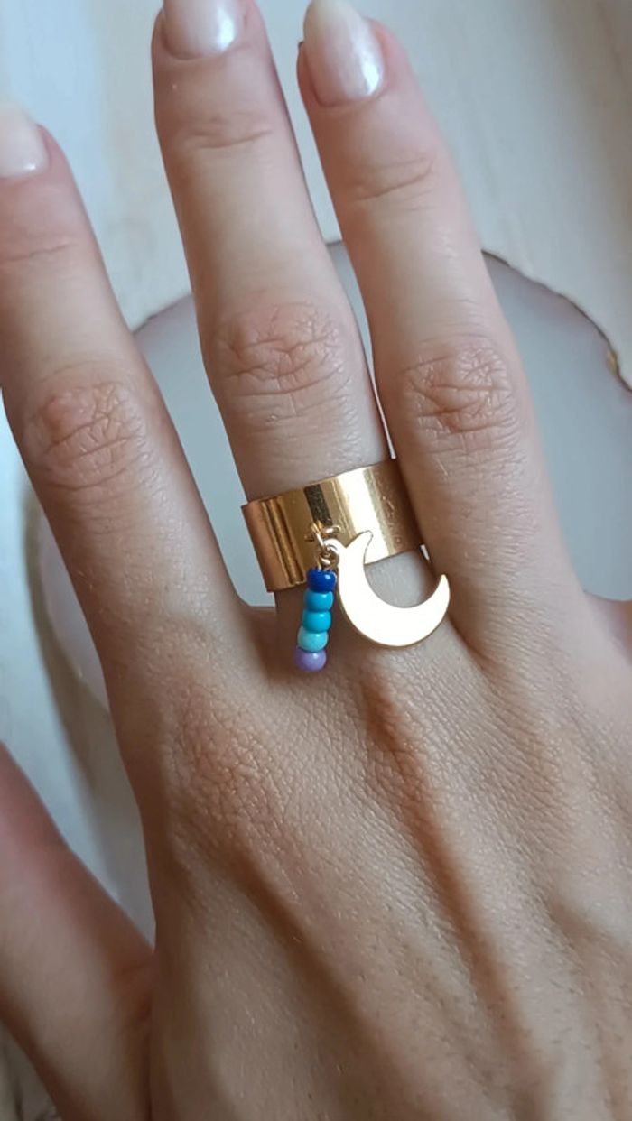 Jolie bague à breloques en acier inoxydable