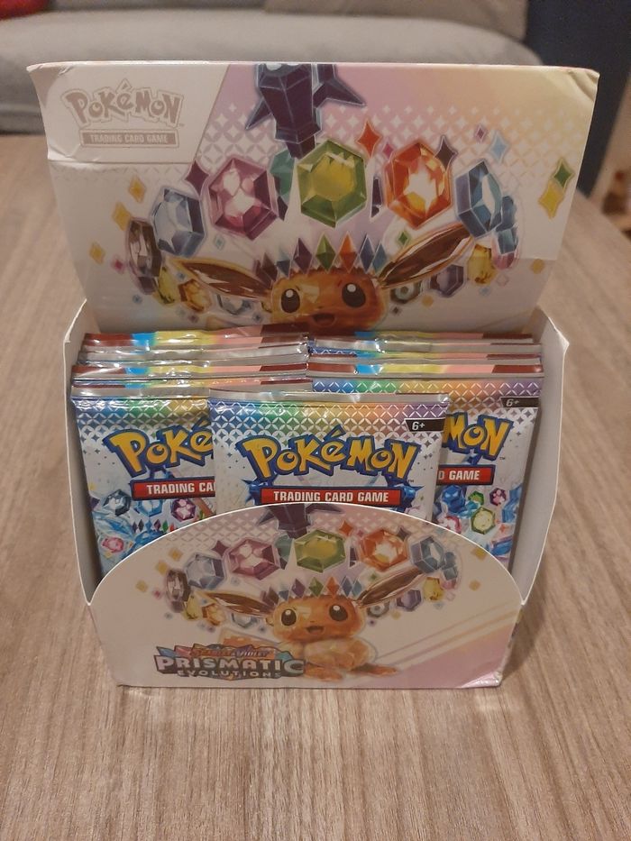 Lot de 13 paquets de booster pokemon version anglais évolution prismatique
