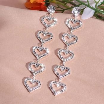 boucles d'oreilles pleine strass brillant