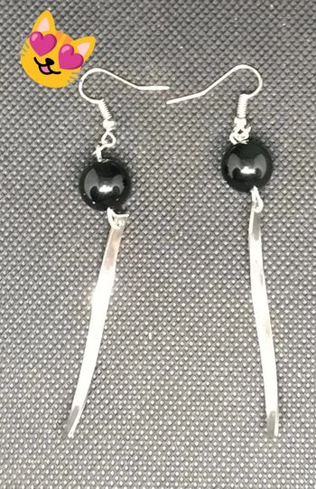 Boucles d'oreilles pendantes perle noire