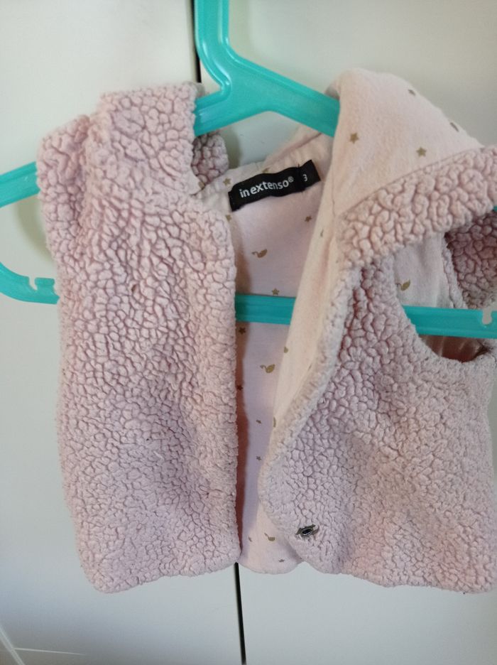 Gilet sans manches à capuche