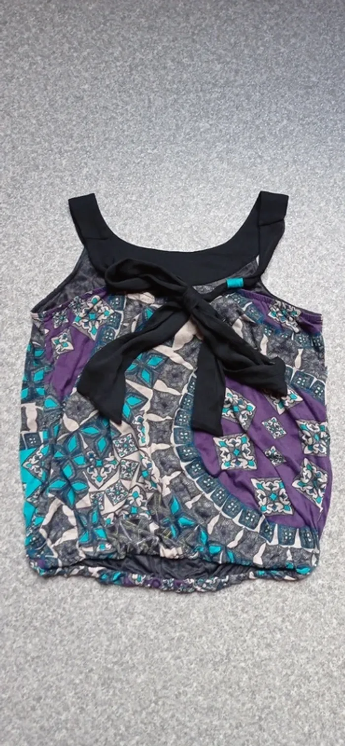 Top été marqué Ici et maintenant
Taille 38/40
Bien porté état satisfaisant tissu qui Bouloche - photo numéro 4