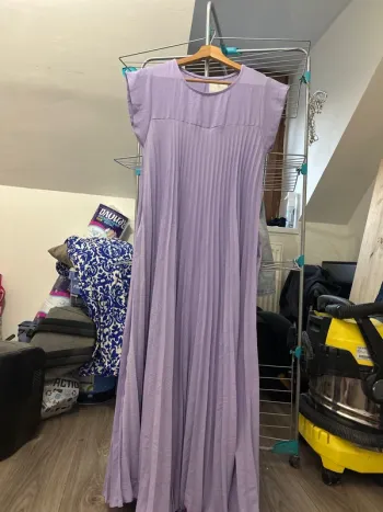 Longue robe plissé