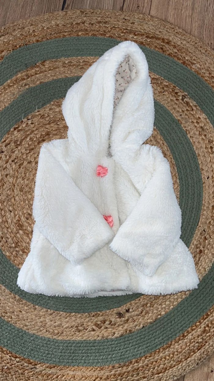 Manteau en fausse fourrure