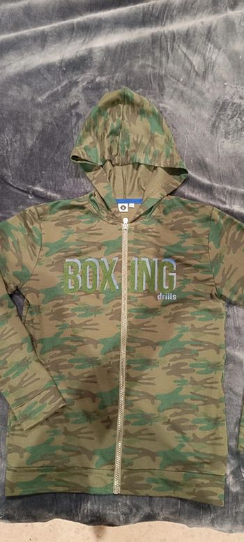 Veste 12 ans excellent état