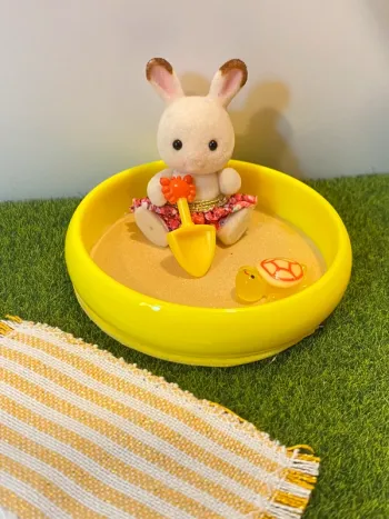 Bébé, lapin, chocolat, plage bac à sable, maillot de bain vêtements stlcanian