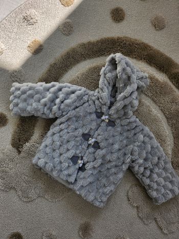 Veste polaire 12 mois neuve 