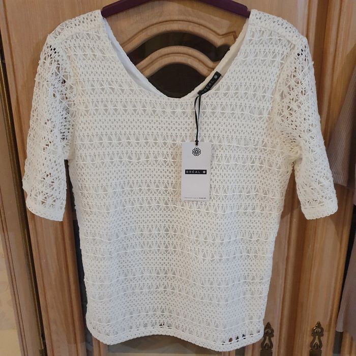 Très joli haut champagne ajouré et doublé Taille S Breal