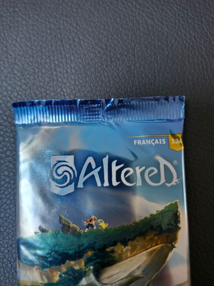 Booster cartes altered au dela des portes