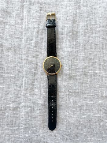 Montre noir et doré