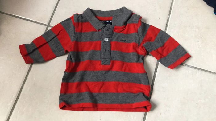 Polo kiabi raye rouge et gris très bon etat 3 mois
