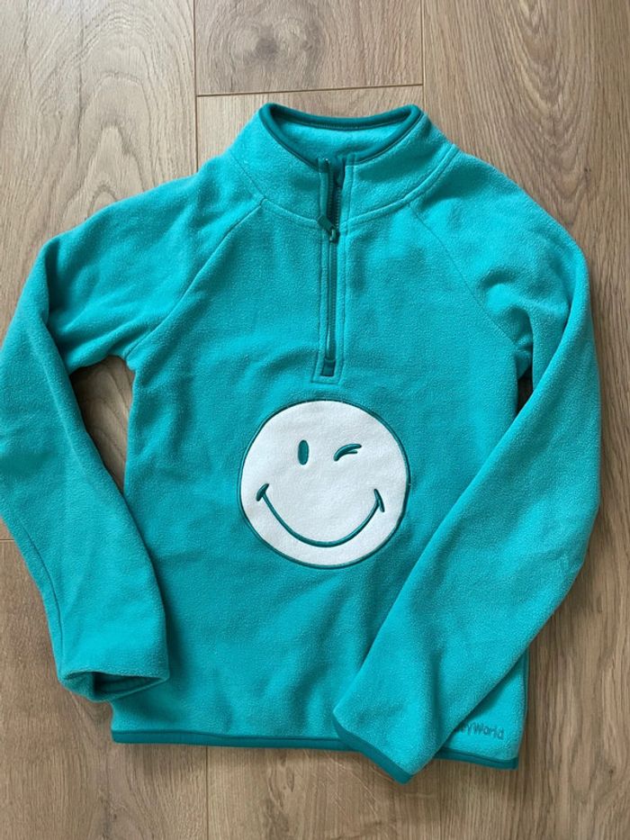 Polaire fille bleu turquoise smiley 8 ans