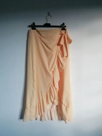 Falda amarilla volantes