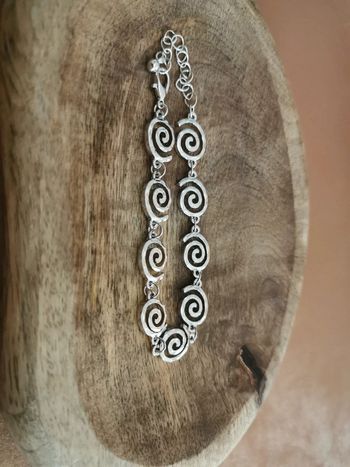 Bracelet femme argenté soleils spirales