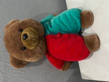 Ours brun habillé bi colores imprimé publicitaire