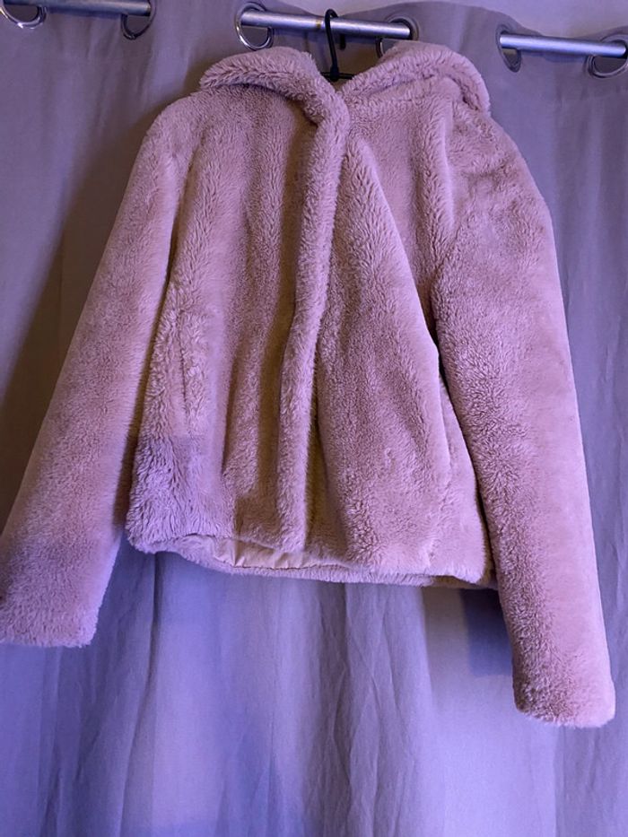 Veste fourrure à capuche