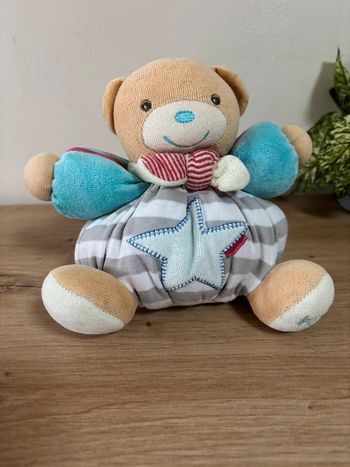 Doudou peluche ours boule grelot étoile bleu kaloo