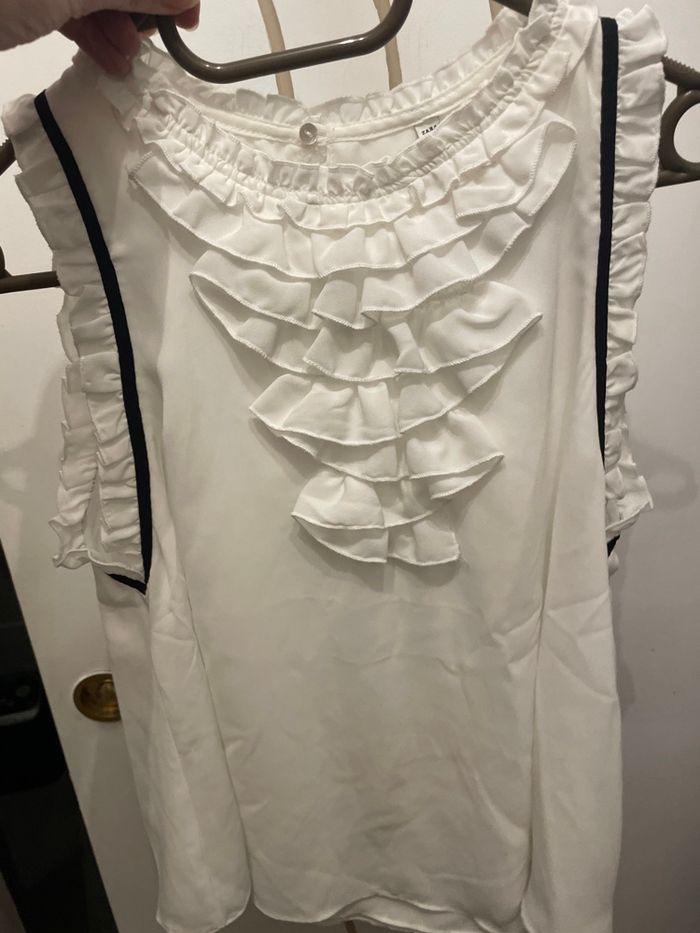 Top blanc avec pt liserer noir