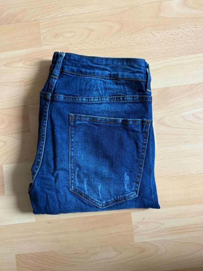 Jeans bleu déchiré pour homme - photo numéro 2