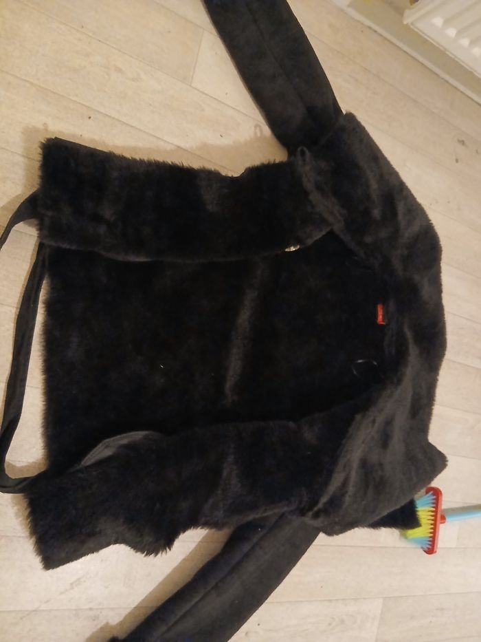 Manteau fausse fourrure