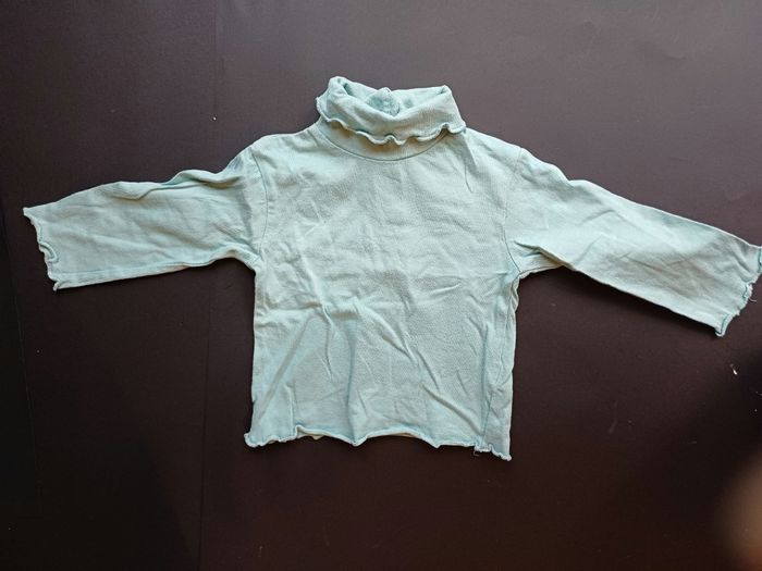 Pull col roulé