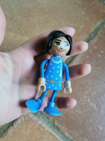 Poupée fléxible en plastique et bois