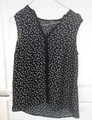 Blouse noire et blanche sans manche ETAM