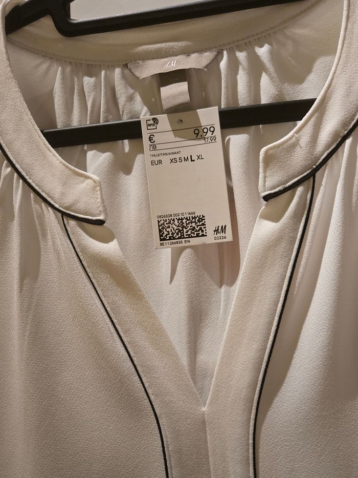 Blouse sans manches blanches T.L 42/44 H&M neuve - photo numéro 2