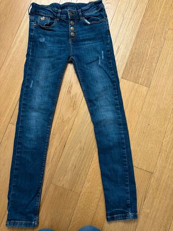 jeans tape à l'œil